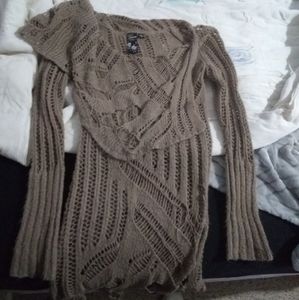 Brown guess holey over sweater
